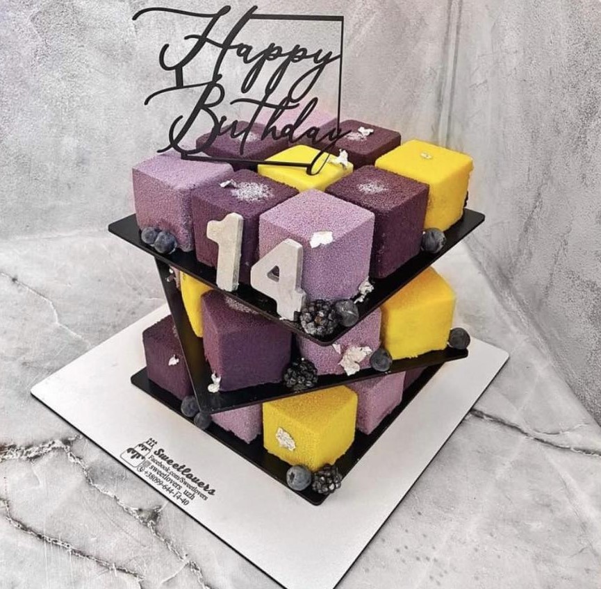 A placeholder cakes with #252322 background.