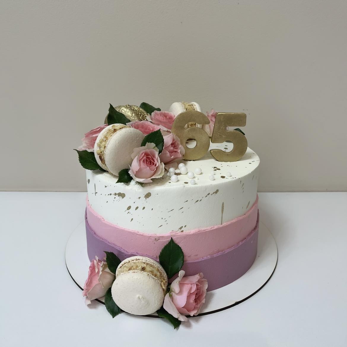 A placeholder cakes with #9A5C66 background.