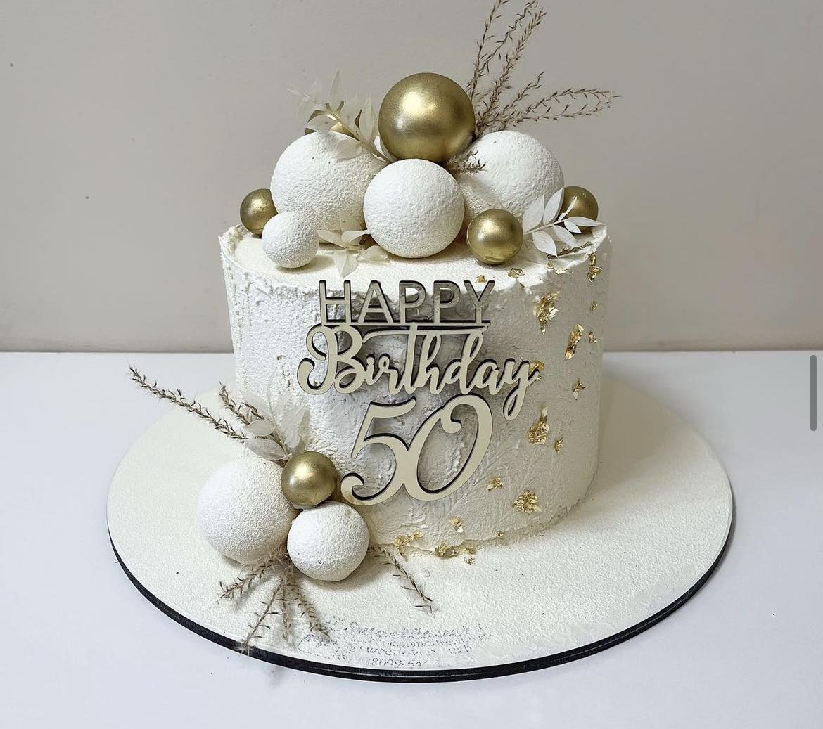 A placeholder cakes with #AF9AAE background.